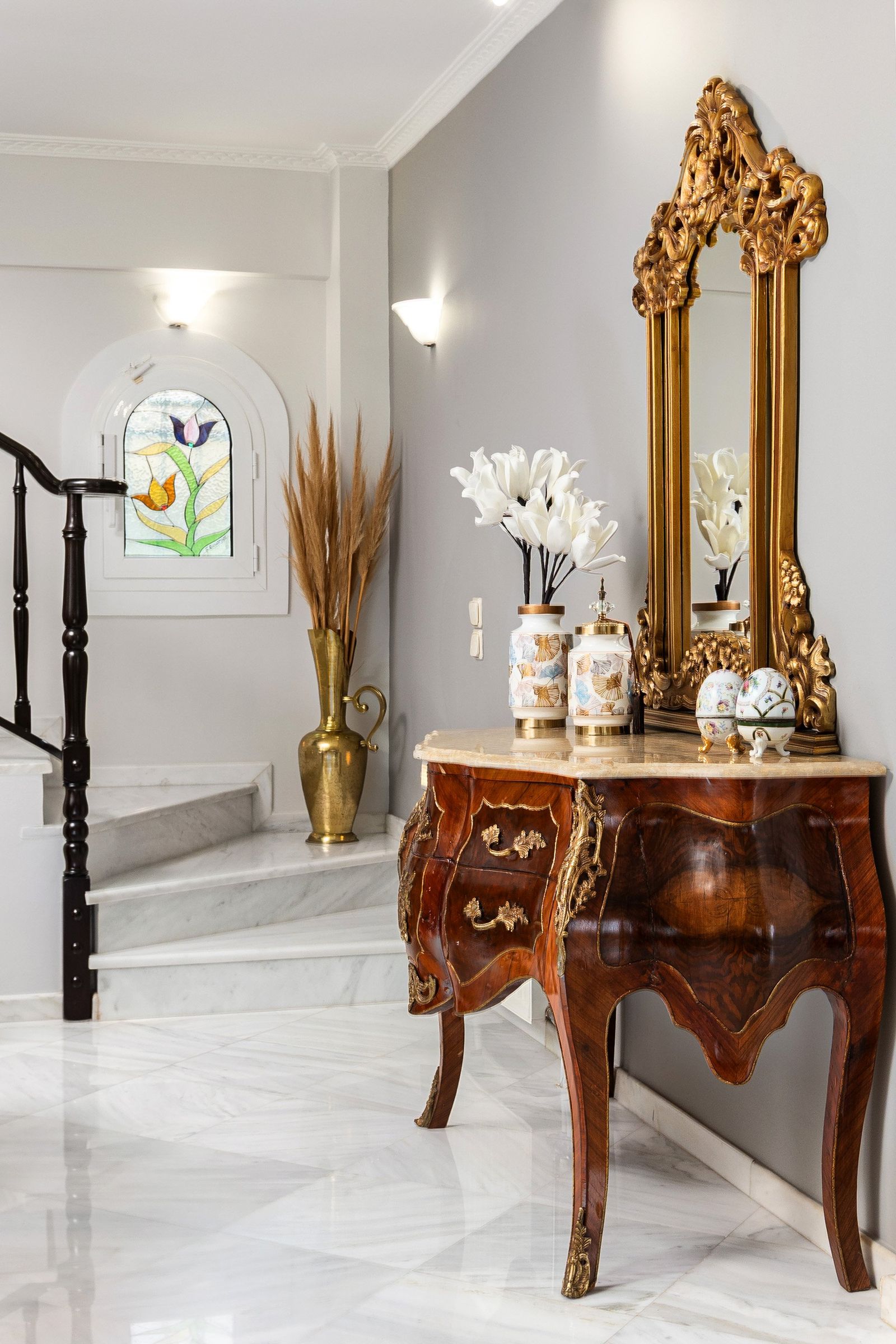 Marble stairs and antique console