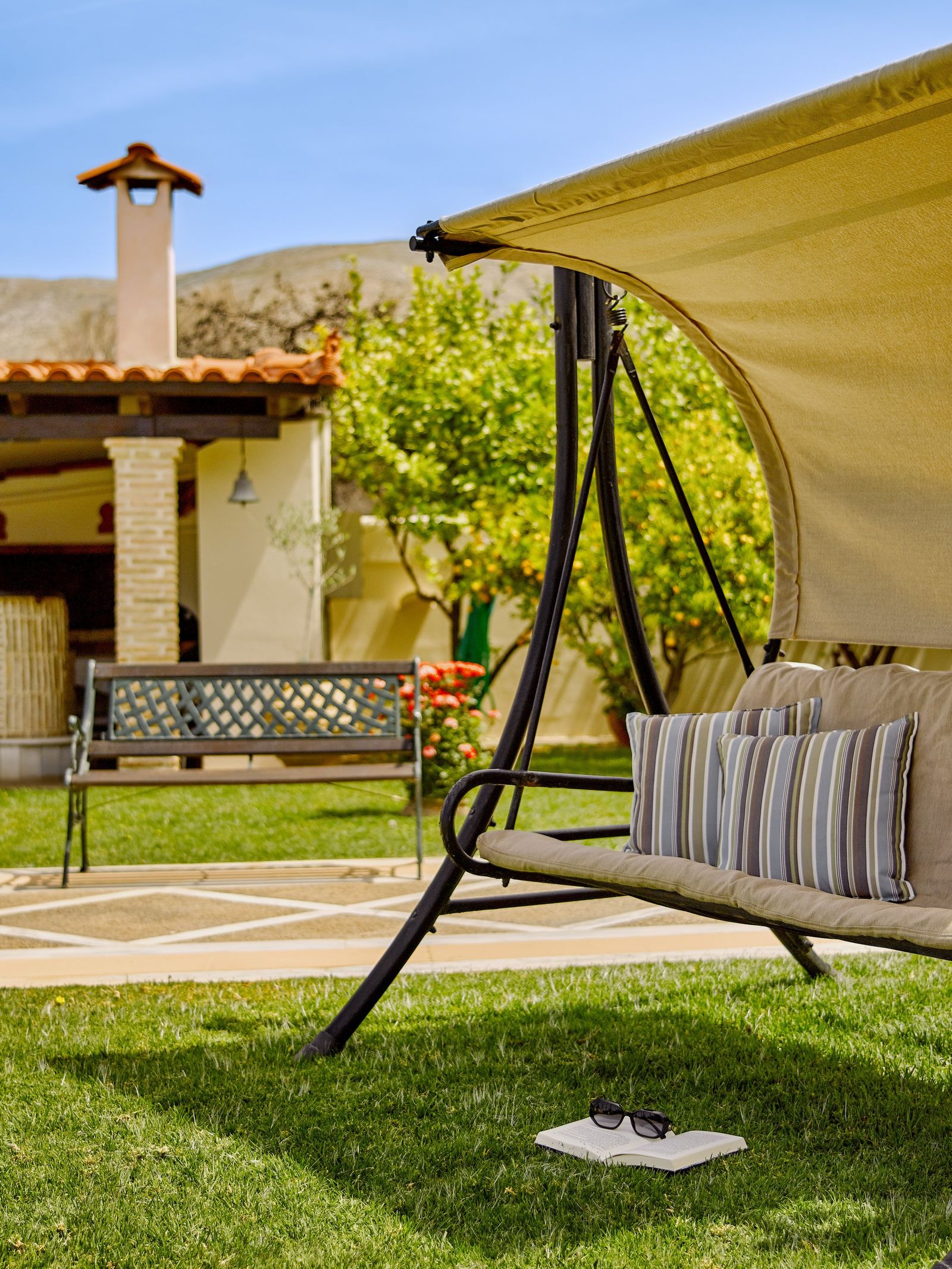 Private garden swing chair green lawn