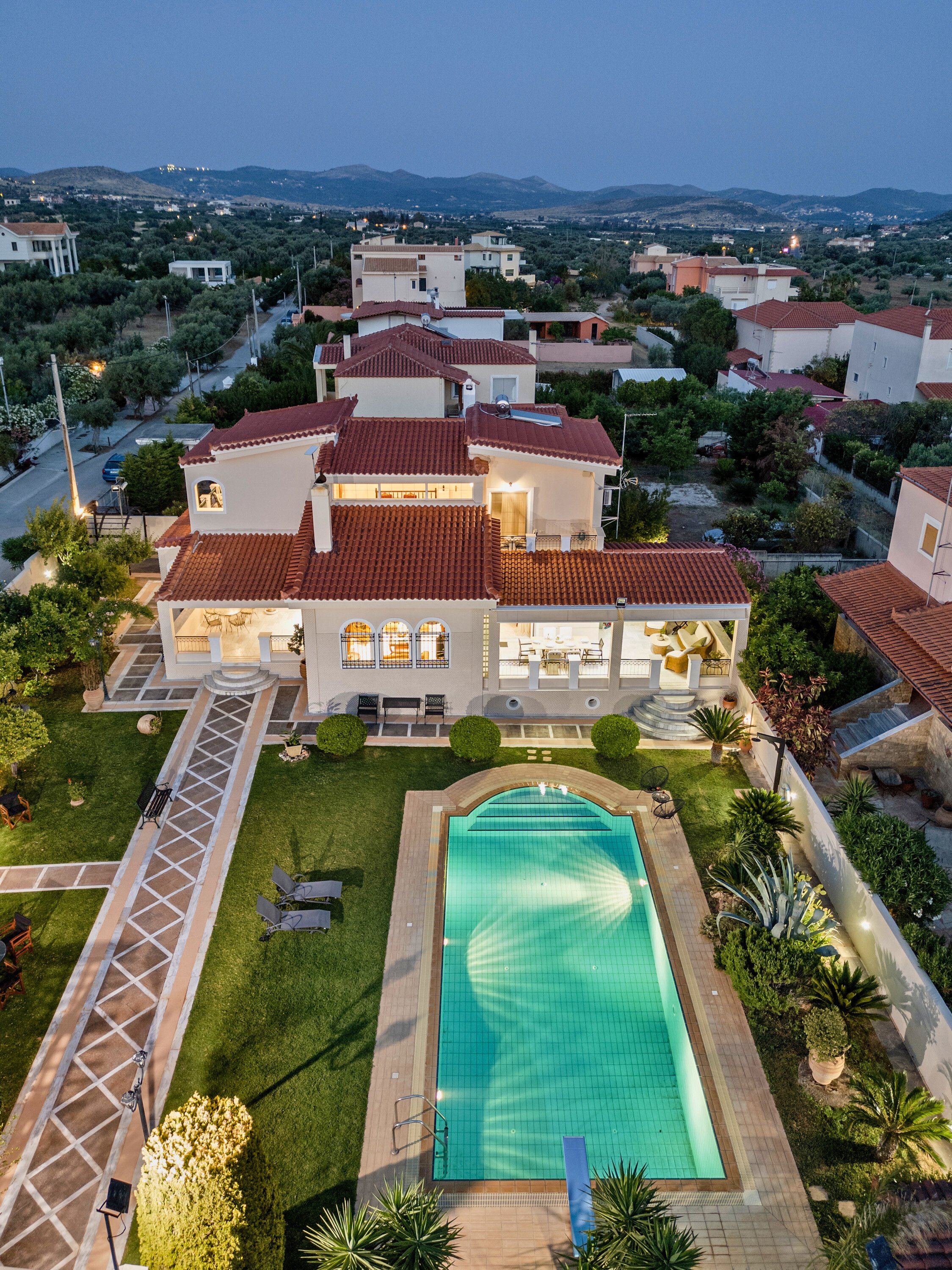 Renko Royal Villa aerial view at dusk, Lagonisi, Attica